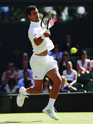 DJOKER ADVANCES TO 4TH ROUND