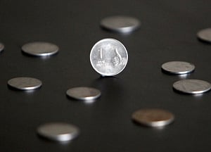 Rupee moves up 8 paise against dollar to 64.52