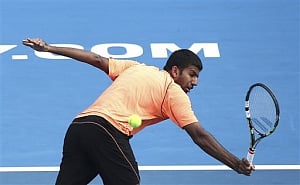 Bopanna advances, Sania loses at Wimbledon