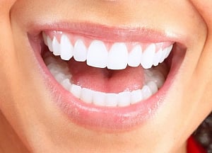 Change your toothbrush, floss teeth regularly for healthy teeth