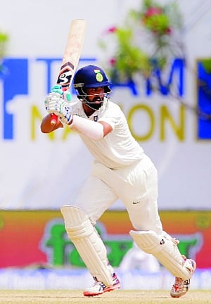 Pujara, Rahane make merry on Day 1