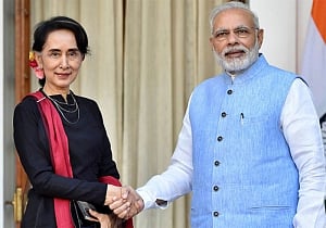 PM Modi presents Suu Kyi copy of her research proposal