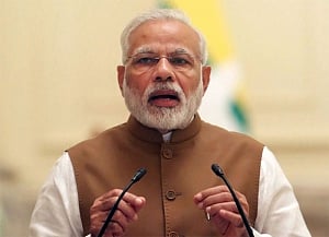Modi calls upon farmers to usher in 'sweet', 'blue' revolution