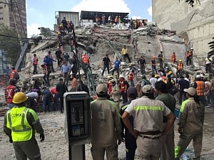 Mexicans dig in rubble seeking survivors as quake kills 248