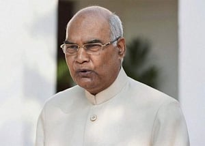 Kovind arrives in Kerala, takes salute amid pouring rain