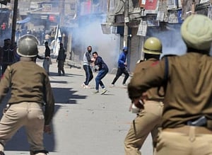 4 injured as security forces fire on mob after 'braid chopping incident'