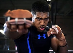 Boxing: Controversy as Joshua retains world heavyweight titles