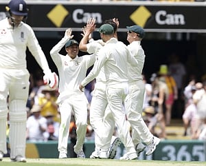 England tail collapses after record stand to post 403