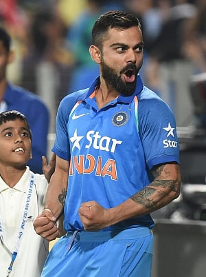 King Dhoni bows out Prince Virat takes guard