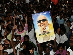 Karunanidhi laid to rest at Marina after court battle; lakhs Bid adieu