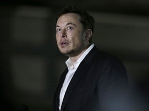 'Tearful' Musk aims for $25,000 Tesla car