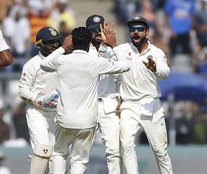 India bowl out England for 161 at tea