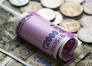 Re hits fresh record low of 70.82, drops 23 paise against US dollar