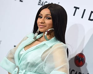 Cardi B accuses paparazzi of racism