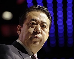 China accuses ex-Interpol chief of bribery, other crimes