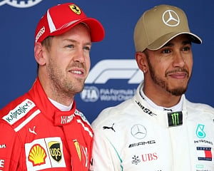 Foes Hamilton and Vettel swap helmets