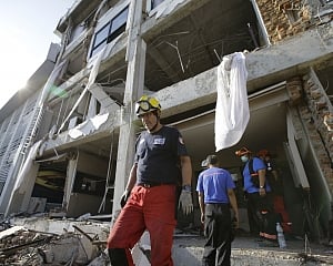 French say no more signs of life in Indonesia hotel rubble