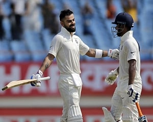 India 506/5 at lunch on Day 2