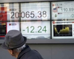 Japan falls, other Asian stocks gain after Wall Street rally