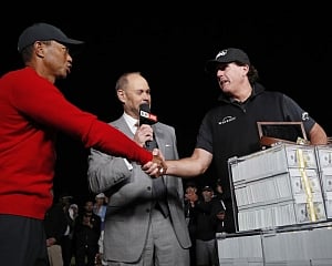 Mickelson wins match against Woods with birdie on 22nd hole