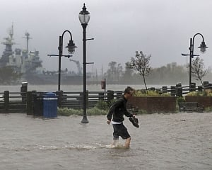 Nearly stalled, Florence besieges Carolinas with floodwaters