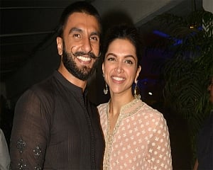 Newlyweds Deepika-Ranveer arrive in India