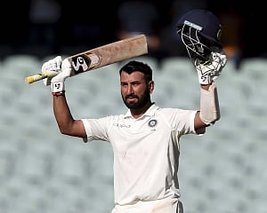 Pujara's maiden hundred in Australia bails India out of trouble