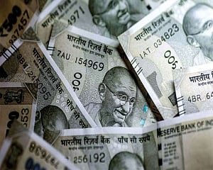 Rupee hits new low of 73.34, plunges 43 paise against USD