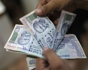 Rupee hits new low of 74.13, plunges 55 paise against US dollar