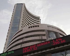Sensex up 200 points on rupee recovery