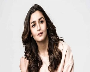 Alia performs 'didi' duties for KJo's son