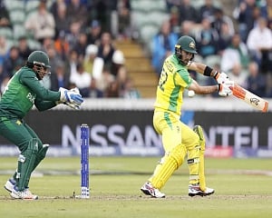 Amir's five-for breaks Australia's back after Warner century