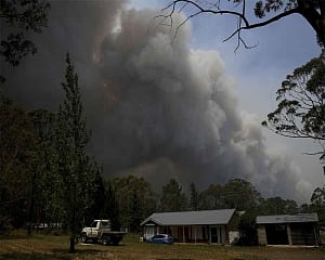 Australian PM apologises for family vacation amid wildfires
