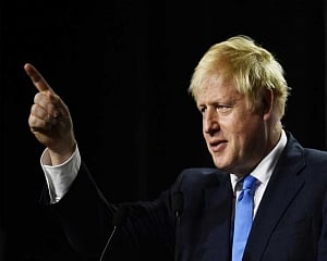 Boris Johnson firm on Brexit as thousands protest in UK