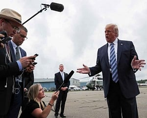 China says it won't 'sit by' on Hong Kong, Trump expresses concern