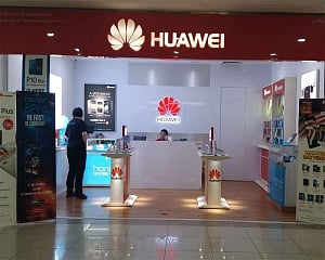 China telecom giant Huawei hints US pressure hurting sales