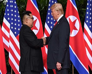 Dismissing missile tests, Trump says Kim won't want to 'disappoint me'