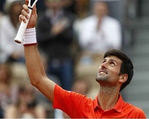 Djokovic motivated by talk of catching Federer in Slams