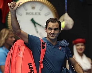 Federer battles into Australian Open third round