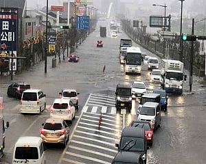 Rescuers hunt for missing as landslides, floods kill 10 in Japan