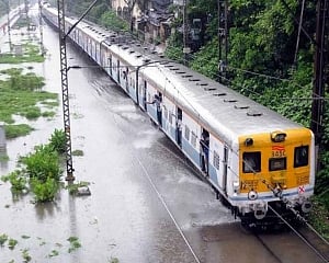 Heavy rain in Mumbai after dry spell; trains, road traffic hit