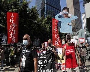 Hong Kong protest leader left bloodied in street attack