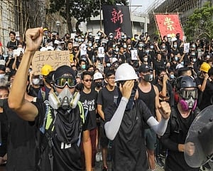 Hong Kong protesters call student boycott, strike after weekend of violence