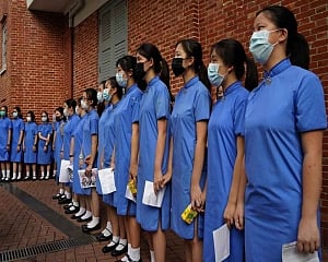 Hong Kong tells US to stay out; students form protest chains