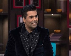 Johar roasted over liking anti-SRK tweet, says Twitter handle having 'technical problem'