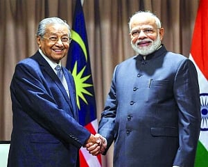 Modi asks Mahathir to extradite Zakir Naik