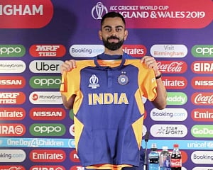 Orange jersey is one-off, blue remains our colour: Kohli