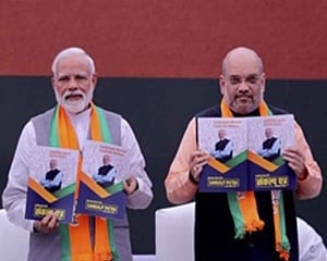 BJP releases manifesto, promises to build Ram temple; PM says nationalism 'our inspiration'