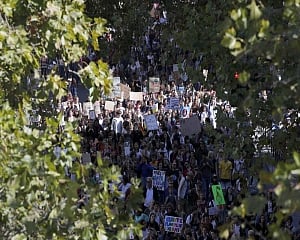 Police use tear gas in Paris amid an array of protests