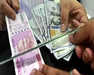 Rupee rises 14 paise to 71.58 against USD in early trade